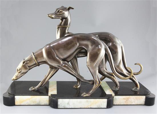 I. Rochard. An Art Deco bronzed spelter group of two greyhounds, length 28in. height 18in.